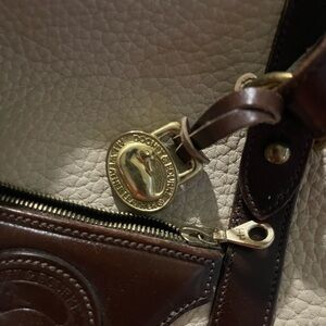 Dooney & Bourke Cream Pebbled Tote with Brown Leather Trim and Gold Hardware